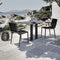    atmosphera-domino-2.0-two-outdoor-dining-armchairs-next-to-sea | ikonitaly