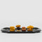 danese milano mari elisabetta | black aluminum tray with small sandwiches | ikonitaly
