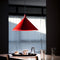 martinelli cono hanging lamp - red over dining table | ikonitaly