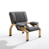 B Line Supercomfort armchair in gray leather with natural oak frame, blending 1960s Italian design with modern neutral tones.