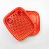 orange dish doctor with green caps open top view by magis