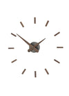 nomon sunset t modern wall clock in walnut wood and graphite