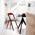Magis_topsy_all_black_table_with_red_chair_in_kitchen | ikonitaly