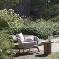    atmospera-ludo-.L6-elegant-outdoor-rocking-chair-in-garden | ikonitaly