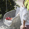 atmosphera-ludo-.L3-hanging-rocking-armchair-in-garden | ikonitaly