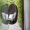atmosphera nest outdoor suspended armchair in garden with cushions