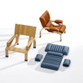 b-line-two-supercomfort-armchairs-one-with-leather-cushion-on-floor | ikonitaly