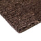 corner detail of hemp loop brown rug | ikonitaly