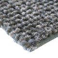 corner detail of the soft rug stone in colour grey by carpet edition | ikonitaly