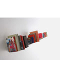 danese milano gomez paz sarmiento metal shelf with books | francisco gomez paz | ikonitaly