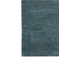 detail of the blue nomad atlas hand knotted rug by carpet edition | ikonitaly
