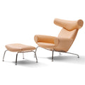 erik jorgensen ox chair iconic lounge chair - light brown leather with footstool  | ikonitaly