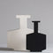 two grecale design vases, black and white, designed by rosaria rattin for kose milano | ikonitaly