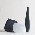 black and white monolite clay contemporary vases from kose milano | ikonitaly
