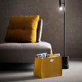 limac-design-yellow-leather-magazine-rack-next-sofa | ikonitaly
