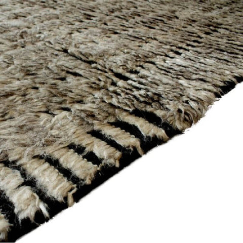 loom of the nomad dune woven wool rug in grey/black by carpet edition | ikonitaly