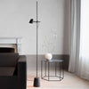 luceplan counterbalance floor lamp in living room