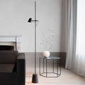 luceplan-counterbalance-floor-lamp-in-living-room | ikonitaly