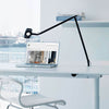 luceplan otto watt slim table lamp black with laptop