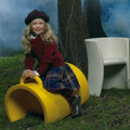 magis-trioli-aarnio-children-chair-riding-yellow | ikonitaly