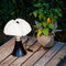 martinelli minipipistrello iconic table lamp - dark brown on side table | ikonitaly