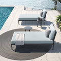 michelangelo-round-fabric-outdoor-rug-sand-under-sunbed-atmosphera | ikonitaly