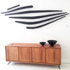 minimaproject the bends dark matt grey over a sideboard