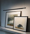 nemo linescapes pendant horizontal suspension lamp black over paintings - designer nemo design studio | shop online ikonitaly