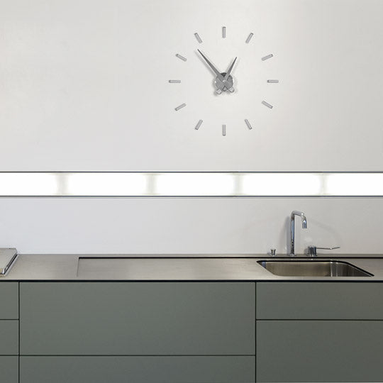 nomon puntos suspensivos linear wall clock   ikonitaly