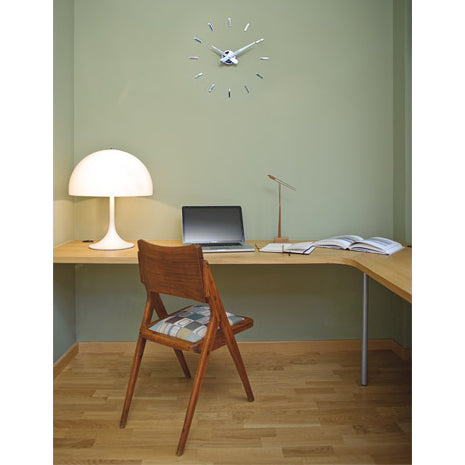 nomon puntos suspensivos linear wall clock   ikonitaly