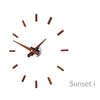nomon sunset i   chrome and walnut wall clock   ikonitaly
