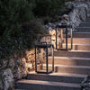 two atmosphera alba large outdoor lanterns on steps