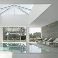 white-sunbeds-indoor-poolside-residence-atmosphera-wind | ikonitaly