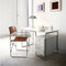 zanotta 2120 april gae aulenti folding chair brown leather near desk