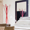 zanotta aster coat hanger red next to mirror | shop online ikonitaly