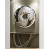 elegant stainless steel mirror over a consolle, ideal for the entrance in a home